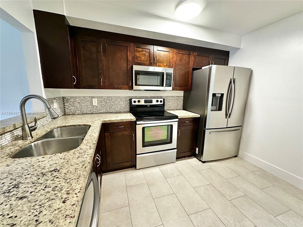 Photo of 4245 S Pine Island Rd, Davie, FL 33328 (MLS # A11864575)