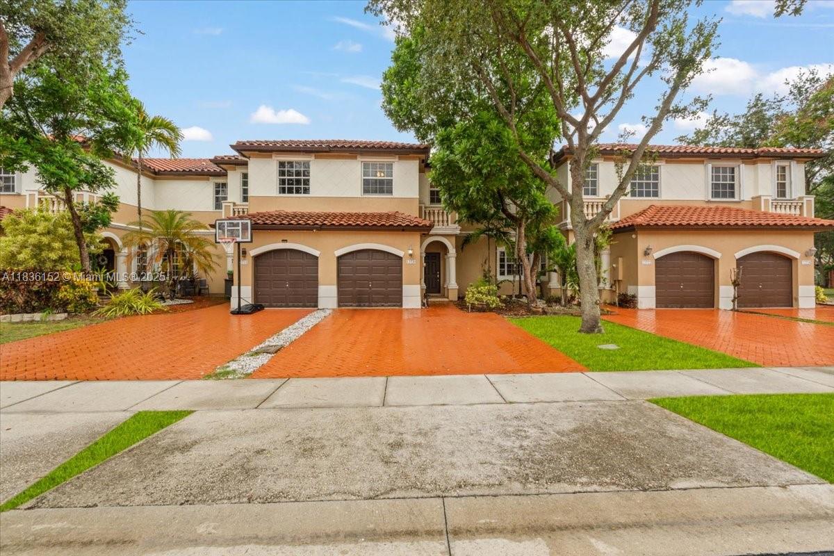 Beautifully remodeled home in the gated community of Vizcaya! This move-in ready gem features an open layout with upgraded floors, a modern kitchen, stylish finishes, and impact windows upstairs for added peace of mind. Enjoy indoor-outdoor living with a fully turfed backyard—perfect for relaxing, entertaining, or family fun with no lawn maintenance. This home is perfectly situated near top-rated public and private schools. Located on a quiet street with great curb appeal and a spacious driveway. Don’t miss it!