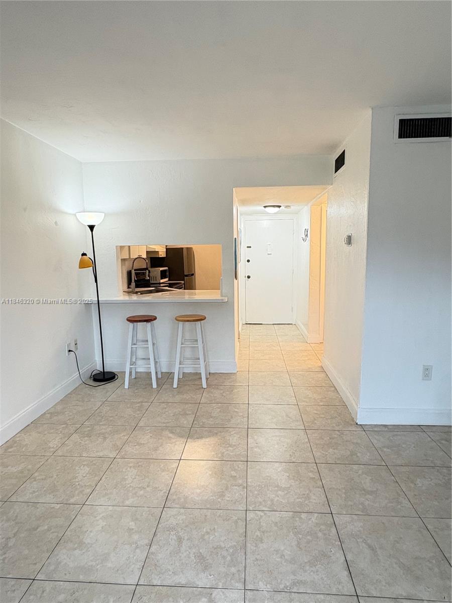 Welcome to this bright and airy corner studio located in the gated Silver Palms community! Step inside to a thoughtfully updated space featuring a modern kitchen with a new refrigerator, a refreshed bathroom, and a light-filled living area that opens to a private balcony with tranquil garden views—perfect for your morning coffee or evening unwind. Additional highlights include a new A/C unit and upgraded electrical panel for added peace of mind. Enjoy the convenience of being minutes from Dadeland Mall, major highways, and the Metro rail, placing shopping, dining, and commuting right at your fingertips. Check this out​​‌​​​​‌​‌​​​‌‌​​​‌‌‌​​‌​​‌‌​​​​ now!