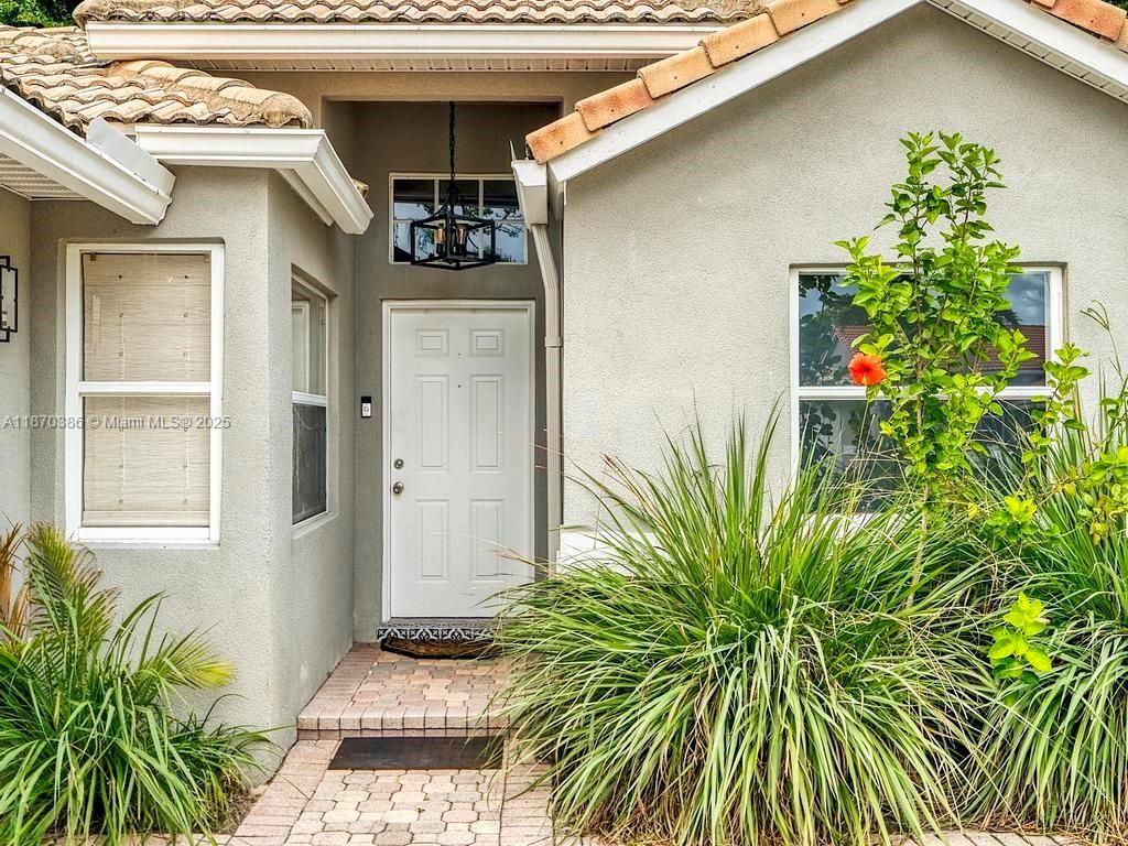 Photo of 5397 Grande Palm Cir, Delray Beach, FL 33484 (MLS # A11870386)