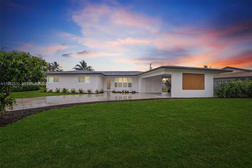 Stunning Designer-Renovated Pool Home Located in the Addison Mizner school district, East of I-95 – Move-In Ready Luxury Living. Charming 3-bedroom, 2-bath residence offering modern luxury and effortless South Florida living just minutes from beaches, shopping, and top dining. The bright open-concept design features a spectacular Italian-style kitchen with exotic quartz countertops, dramatic waterfall island, sleek cabinetry, and high-end stainless steel appliances including a wall oven. Major upgrades include impact windows and doors, new A/C with updated ductwork and modern vents, elegant LED lighting, washer and dryer, and a brand-new roof (2026). The spacious primary suite offers a comfortable, beautifully designed bathroom, custom closet, and private pool access.
Enjoy your private tropical oasis with upgraded Diamond Brite pool, lush landscaping, irrigation system, expansive terrace for entertaining, and spacious carport.