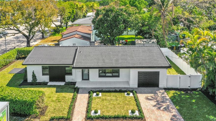 Beautifully remodeled 3-bedroom, 2-bathroom home located in the desirable Village of Miami Shores. This move-in-ready residence features a fully updated kitchen with new countertops, cabinetry, sink, backsplash, and stainless steel appliances, complemented by stylish accent walls in the dining area.

Both bathrooms have been tastefully renovated with new vanities, sinks, and modern walk-in showers. Additional upgrades include custom closets, fresh interior paint, new interior doors, and impact windows throughout.

The home offers a bright, open layout with spacious living areas and abundant natural light. Step outside to a large backyard with fresh landscaping, perfect for entertaining or relaxing.

Enjoy the charm of a peaceful, tree-lined neighborhood with a strong sense of community, all while being just minutes from Downtown Miami, the Miami Design District, Wynwood, and the area’s beautiful beaches. Nearby amenities include parks, dining, shopping along NE 2nd Avenue, and golf at the Miami Shores Country Club.