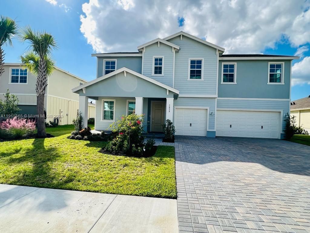 Photo of 1079 Haywagon Trl #1079, Loxahatchee, FL 33470 (MLS # A11915565)