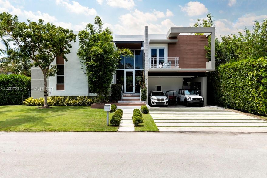 A new modern home located on Key Biscayne that redefines contemporary style. Welcome inside this 5 BD and 5 BA + 1 HB, two-story residence that spans 4,400 SF. Recently built in 2017, it’s completely move-in ready. Immediately upon entering the home, residents will find a spacious open floor plan filled with an abundance of natural light and complete with a large living space, dining room and kitchen with Miele appliances. It offers the perfect design balance of clean lines, bold aesthetics, and warm woods throughout. Residents can also experience additional rooms, including a laundry room, office, media room with a projector & hidden screen. Extra features: sound system throughout w/ hidden speakers, smart system to control sound, lights and alarm and Tesla solar panels & battery system.