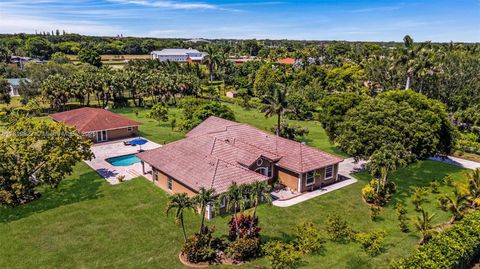 Photo of 12851 Luray Rd, Southwest Ranches, FL 33330 (MLS # A11819827)