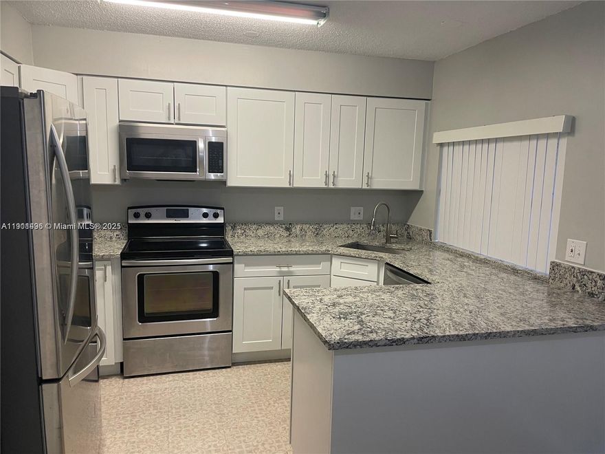 It is on the first floor for the convenience of whoever uses the unit, and is completely remodeled. Tamarac School District, amazing location with Publix easily walk and other shopping, restaurant an access to the Turnpike.