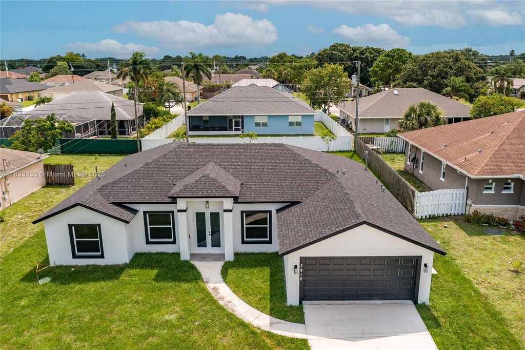 Photo of 3910 SW Laffite St, Port St Lucie, FL 34953 (MLS # A11833233)