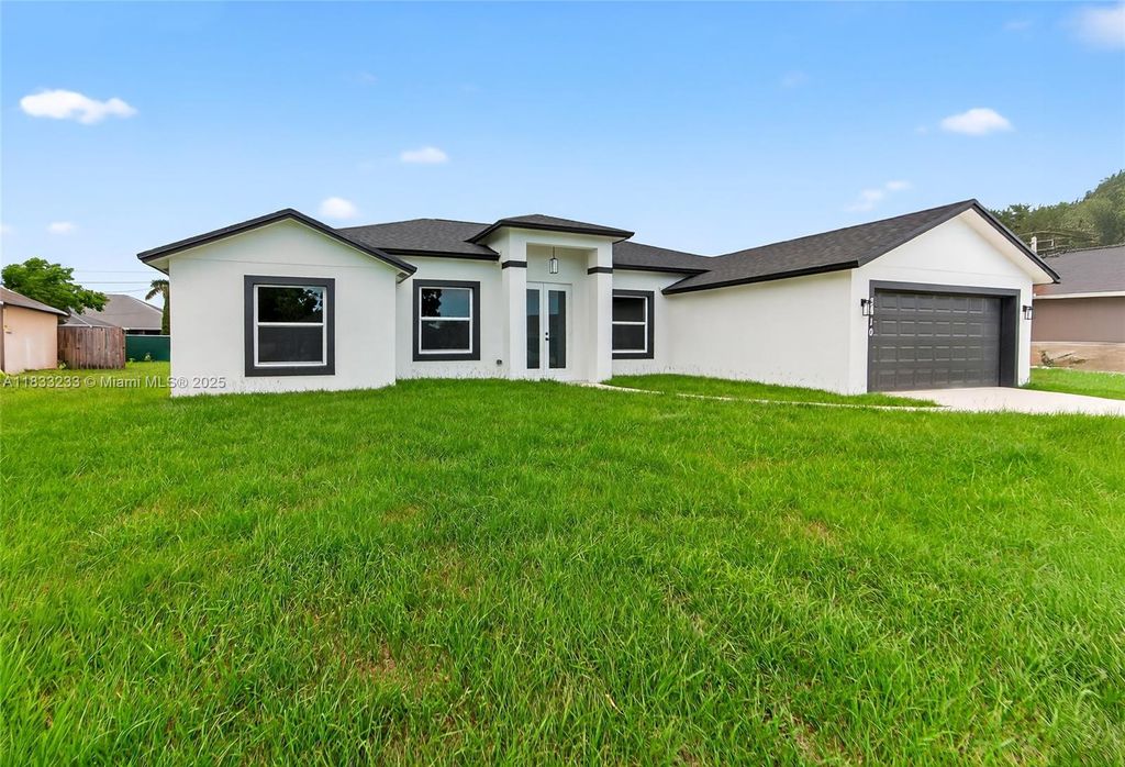 Photo of 3910 SW Laffite St, Port St Lucie, FL 34953 (MLS # A11833233)