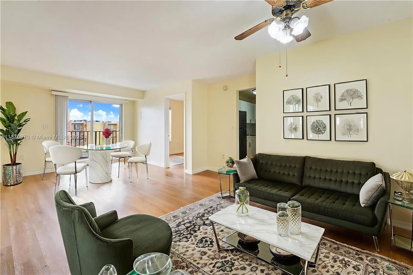 TOP FLOOR GEM in Sunset Villas gated community! This unit boasts a spacious floor plan, 2 BD, 1 BTH. Renovated with laminate flooring, a luminous modern kitchen and bathroom with a walk-in closet. Scenic lake views and bask in the morning sun on your east-facing balcony. Effortless to rent, it comes complete with a parking space. Whether you're an investor or a future homeowner, this property offers the perfect blend of comfort, security, and convenience. Comes with 1 assigned parking space, plus ample visitor parking. The condominium offers a brand-new pool, tennis courts, a children's playground, and a community room. Close to the airport, Coral Gables, and major highways! Leased until 10/31/2025 for $2,100.