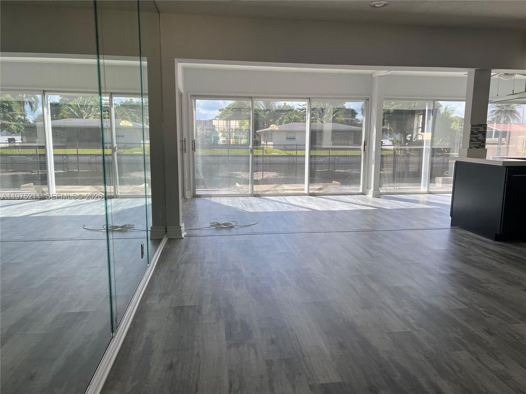 Photo of 5909 NW 67th Ave, Tamarac, FL 33321 (MLS # A11975211)