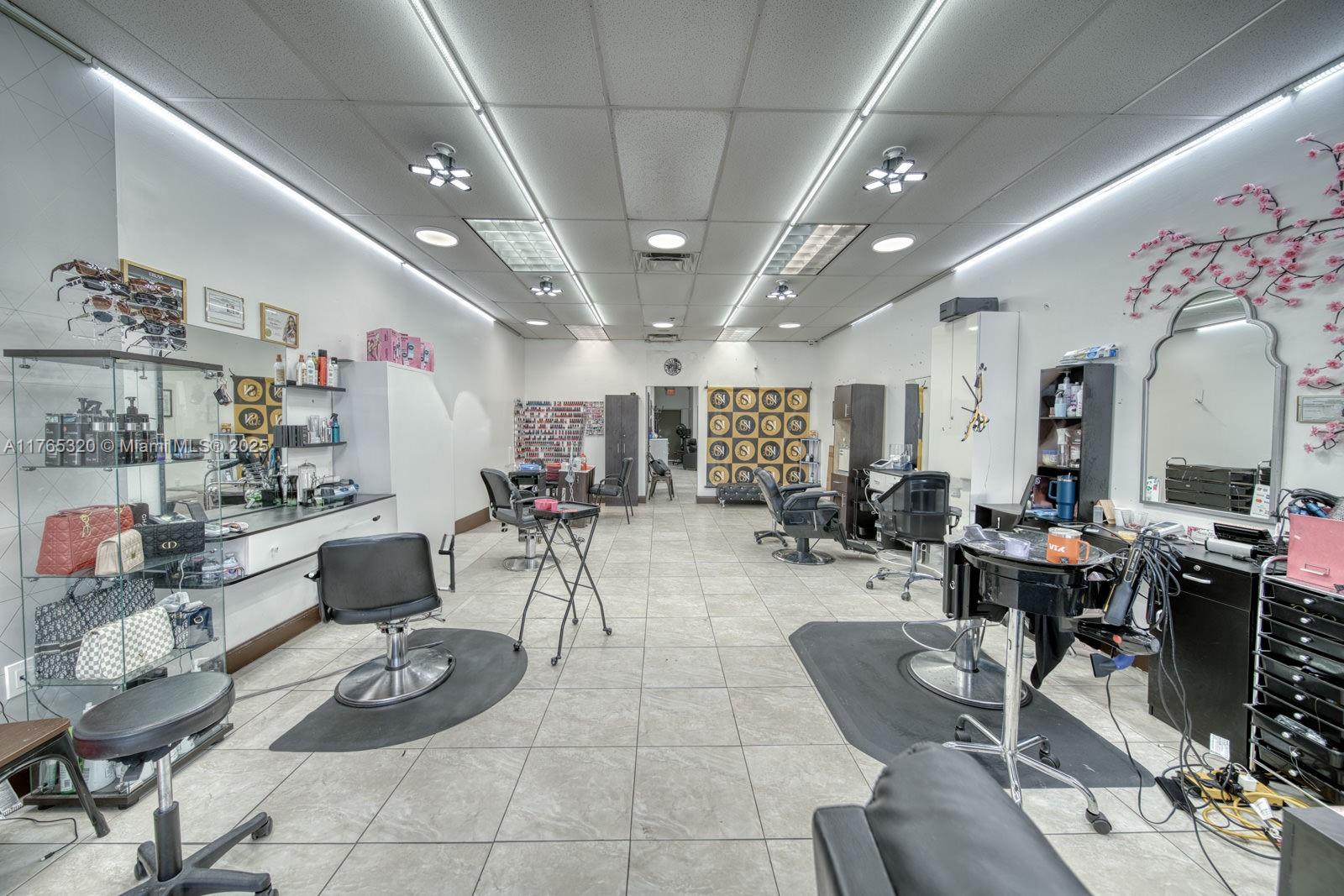 Well-established beauty salon in a high-traffic shopping plaza anchored by a Sedano’s supermarket, popular restaurants, and essential service businesses that consistently attract a steady stream of customers. The salon features 4 styling stations, 2 shampoo wash bowls, and 2 private rooms for facials, waxing, and eyebrow services. Additionally, it includes a comfortable customer waiting area and a dedicated staff break room. Prime location on SW 8th Street near Florida’s Turnpike. Low rent and a long-term lease are available. Don’t miss this incredible opportunity to own a thriving salon in a prime location!