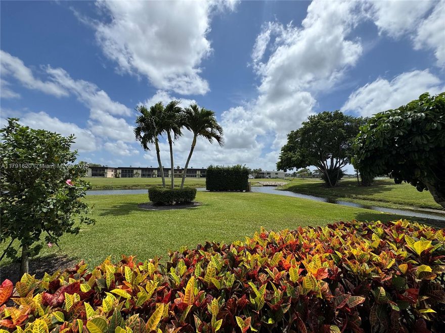 Welcome to this vibrant 55+ community offering comfort, convenience and a resort-style amenities. This first floor, corner unit is located close to the pool with lake and golf views. Washer and dryer on screened patio. This gated community offers golf, pool, tennis court, fitness center, shuffleboard, and a lot of activities. Easy to show!