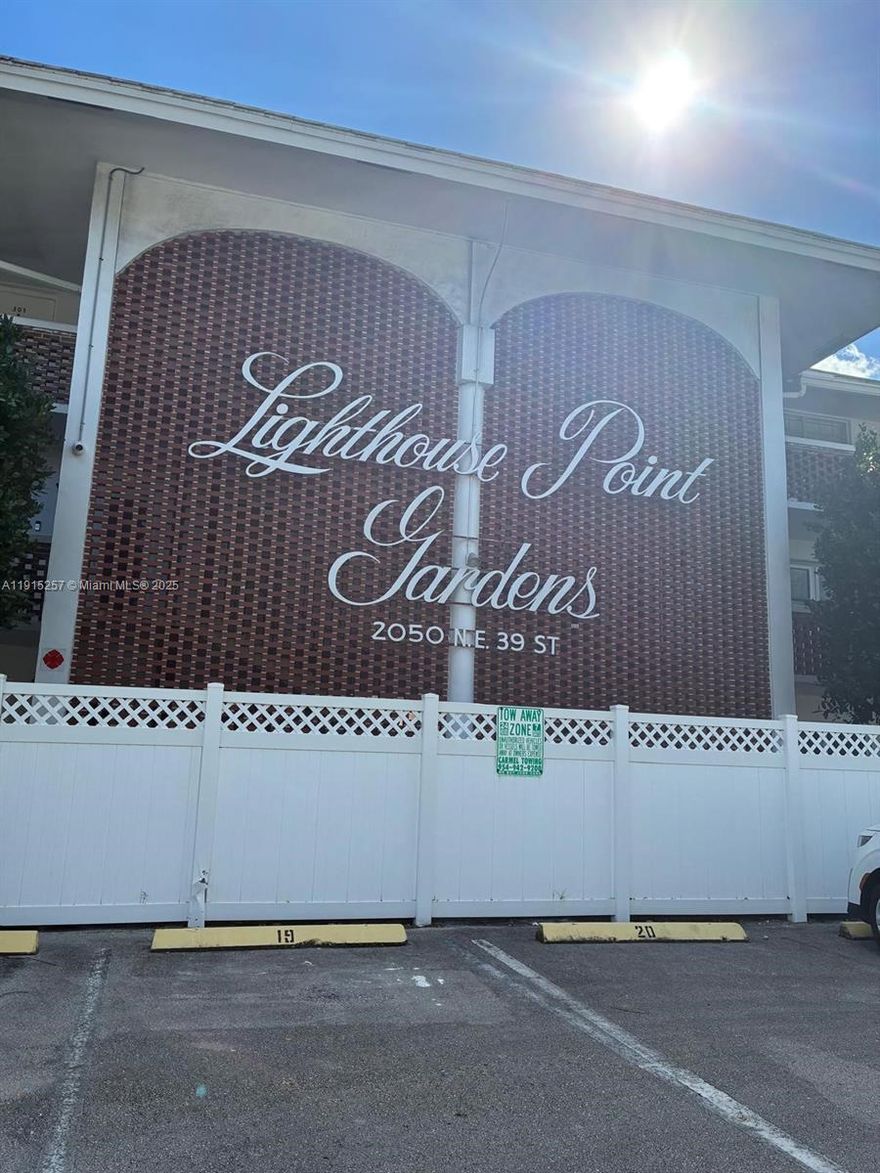Great opportunity in Lighthouse Point Gardens, a well-maintained 55+ community east of US-1 and just minutes to the beach. This bright 1 bedroom, 1.5 bath unit features a comfortable layout, tile floors and plenty of natural light. Enjoy beautifully landscaped grounds with a heated pool, clubhouse, shuffleboard, putting green, BBQ area and common laundry. One assigned parking space plus guest parking. No pets. Renting limited as per association. Excellent location close to Publix, dining, shopping and beaches. Easy to show!