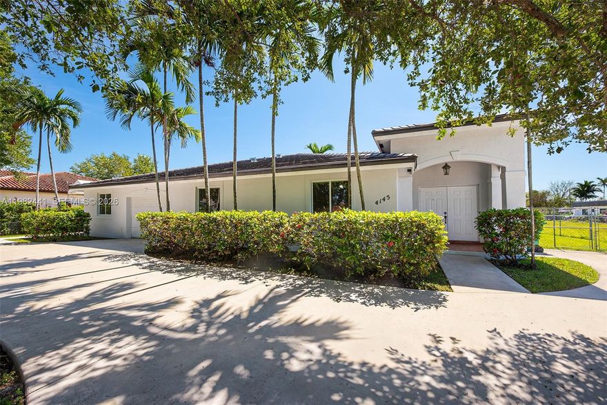 Welcome to this turnkey 4-bedroom, 3-bath home on a 16,934 sq ft lot (approx. 100’ x 160’ per survey). As you walk in, you instantly feel at home. It is a well-designed layout with great flow between living, dining, family room, and kitchen, all overlooking the backyard. The house is filled with natural light throughout. Comes with two en-suite bedrooms, including a private suite with separate entrance, which is ideal for guests or in-laws. The primary bedroom is large and features two walk-in closets. All bedrooms are spacious with ample closet space. Recent updates include a 2023 roof, impact windows and doors, freshly painted interior and exterior, and a brand-new washer. Additional features: one-car garage, indoor laundry, a lot of front parking with large driveway in front and an extra-wide side yard with room for RV or boat. Also includes a convenient side storage room for extra storage space. The backyard is large with plenty of space for a pool and outdoor living.  You can also enjoy a nice sized patio area perfect for relaxing or entertaining. Property qualifies under Miami-Dade guidelines to add an auxiliary dwelling unit (separate guest house) at the rear. This property is also located in a great location near major expressways, restaurants, shopping and more. Photos with furniture have been virtually staged for illustrative purposes.