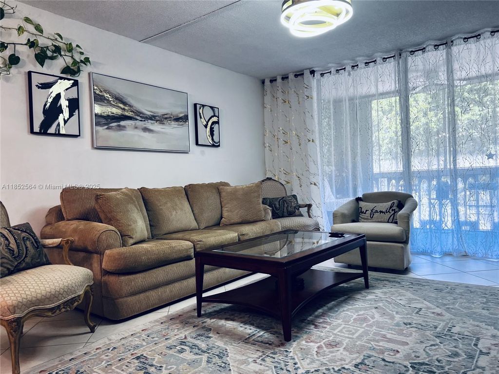 Photo of 320 NE 12th Ave #304, Hallandale Beach, FL 33009 (MLS # A11852564)