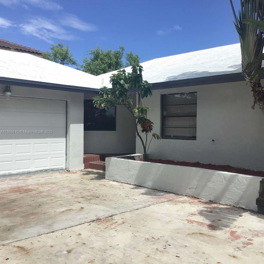 Spacious 4-bedroom, 2-bathroom home with additional room on an oversized 21,257sq. ft. lot in a desirable Miami neighborhood! This property offers plenty of room to grow, featuring a 2-car garage, Huge back patio,  large driveway, and expansive outdoor space perfect for entertaining or future improvements. Inside, the home boasts a functional layout with generous living areas, a versatile additional room ideal for an office or playroom, and well-sized bedrooms. The lot provides endless potential for a pool, garden, or additional outdoor living. Conveniently located near shopping, schools, and major highways, this property is a rare find with both space and versatility. Don’t miss this opportunity to own a home with incredible potential on a large lot in Miami!