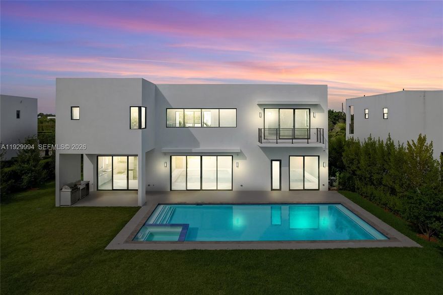 Stunning brand new two-story lagoon front house located in the exclusive community of Botaniko.
It features 5 bedrooms, 5 bathrooms, a powder room, an attached 3-car garage, a huge backyard with a private pool with jacuzzi, and a summer kitchen. Be the first to live in this modern masterpiece designed by world renowned architect Mateu. Built in 2025, the house was just delivered by developer in December and boasts 3,810 Sq Ft of living space over a huge lot spanning 15,933 Sq Ft. The designer kitchen features top-of-the-line appliances (Sub-zero, Wolf, Asko), including a premium coffee-maker. Enjoy luxurious high ceilings and expansive windows, which provide abundant natural light and a seamless indoor-outdoor flow. The beautiful back yard offers lush landscaping, an oversized pool, and a beautiful lagoon view. The residence has extra upgrades such as 3-zone integrated sound system and security cameras. Botaniko Weston is located right in front of Bonaventure golf club, near top-rated schools, restaurants and shops.