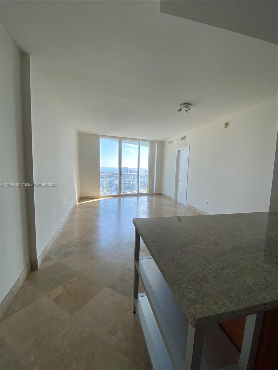 Amazing view, split plan, one assigned parking space. Cable, internet and water are included.