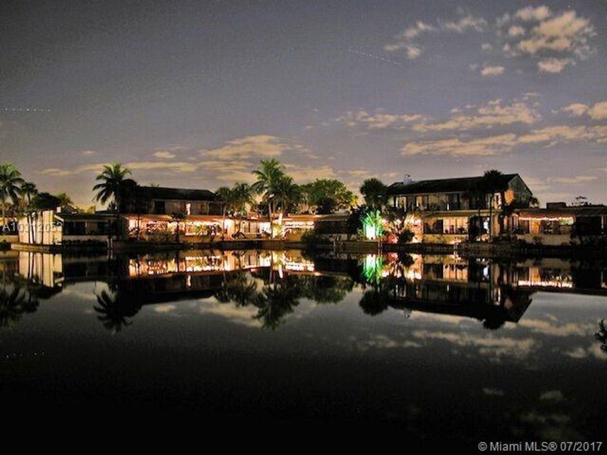 Only unit available.... Lakefront, spacious, and remodeled 4/3 Windmill Lakes beauty! Hard to find remodeled and immaculate move-in condition. Walking distance to Main Street, shops, parks, schools, tennis courts, and fitness center. Spacious terrace with dock, wood floors throughout first floor, living and dining, wood staircase. Wont last long, highly desirable, only unit available in community. Call listing agent directly to schedule showing.