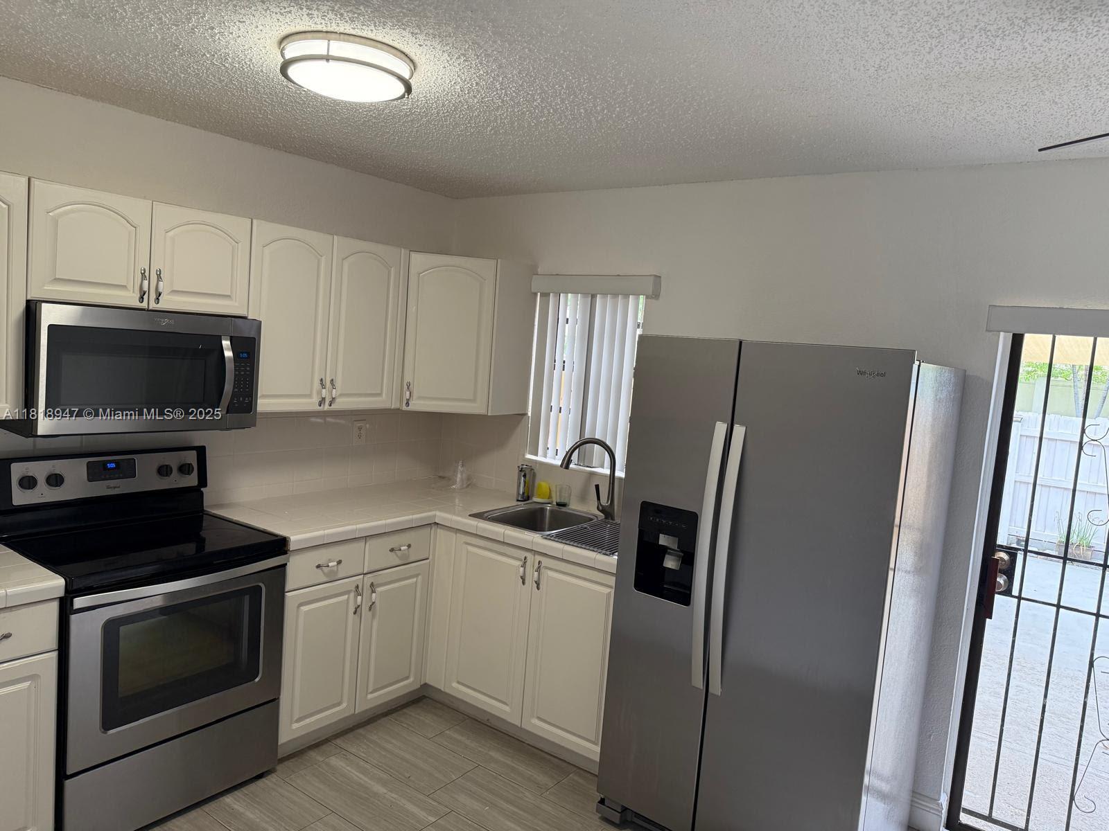 MIDWAY MANSIONS TOWNHOMES - Residential Lease