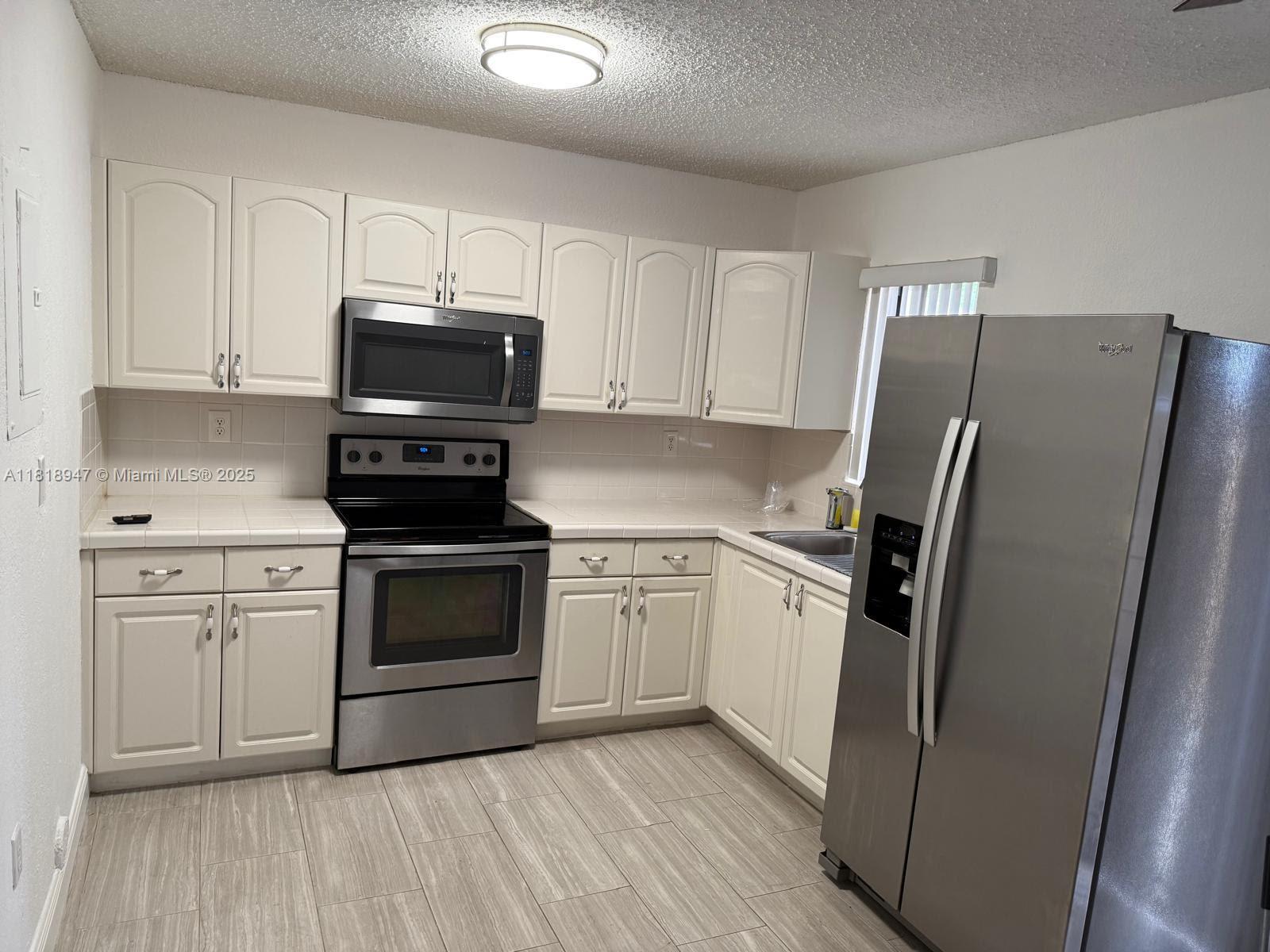MIDWAY MANSIONS TOWNHOMES - Residential Lease