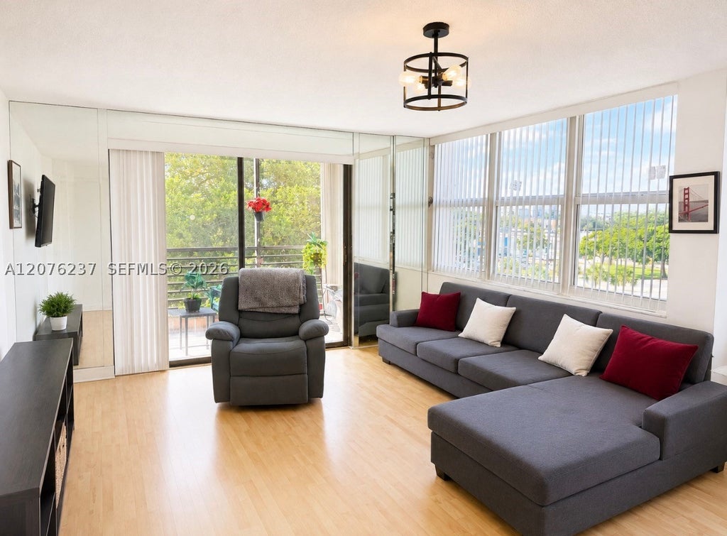 Photo of 1100 Saint Charles Pl #504, Pembroke Pines, FL 33026 (MLS # A12076237)