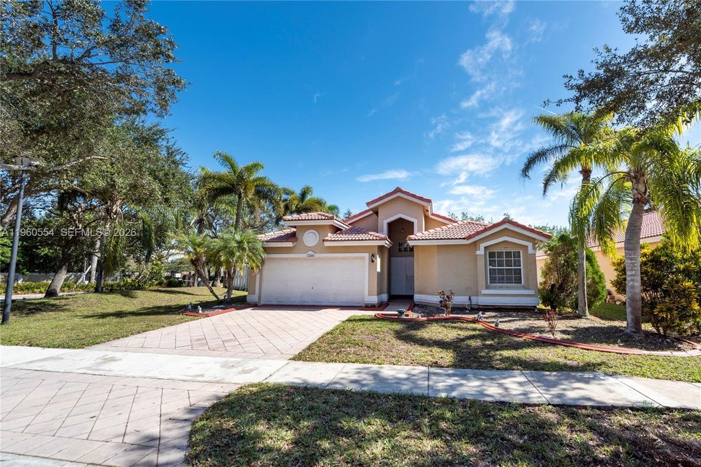 Photo of 2260 NW 137th Ave, Sunrise, FL 33323 (MLS # A11960554)