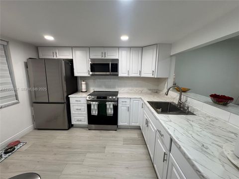 Photo of 900 Colony Point Cir #218, Pembroke Pines, FL 33026 (MLS # A11936387)