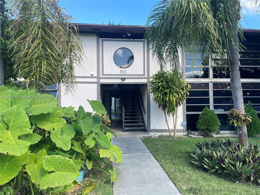 Photo of 911 NE 199th St #203-14, Miami, FL 33179 (MLS # A11921896)