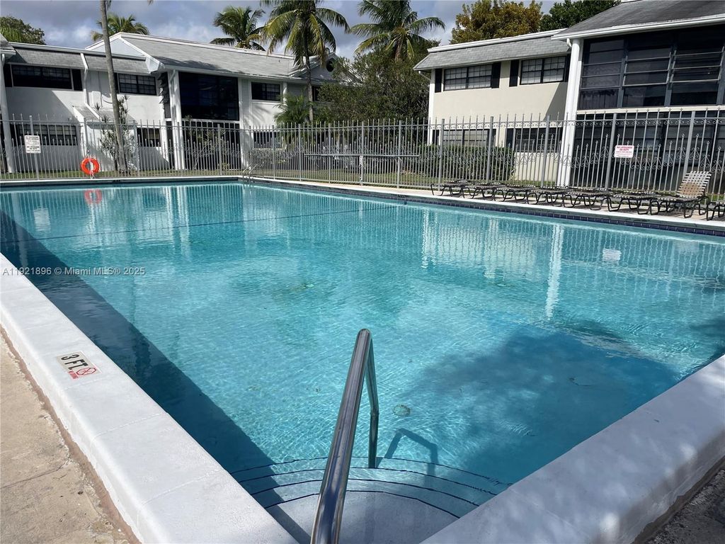 Photo of 911 NE 199th St #203-14, Miami, FL 33179 (MLS # A11921896)