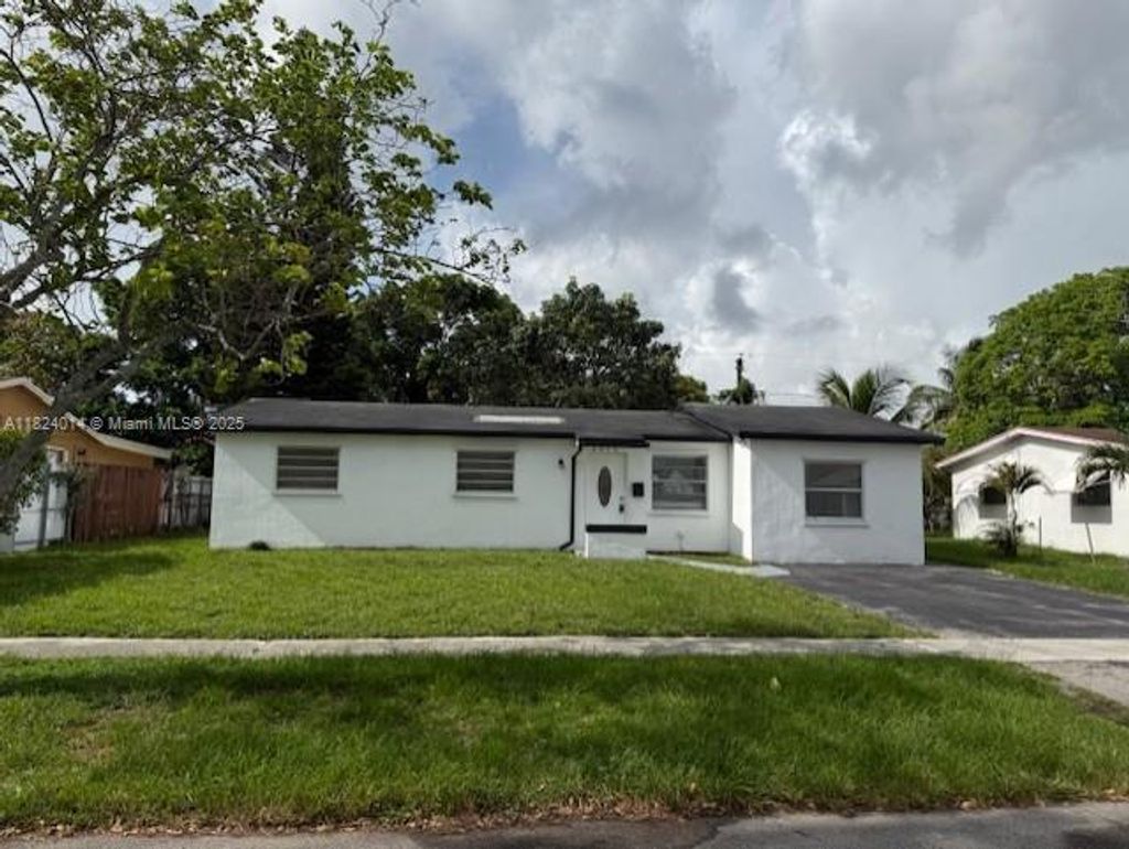 Photo of 4910 NW 18th St, Lauderhill, FL 33313 (MLS # A11824014)