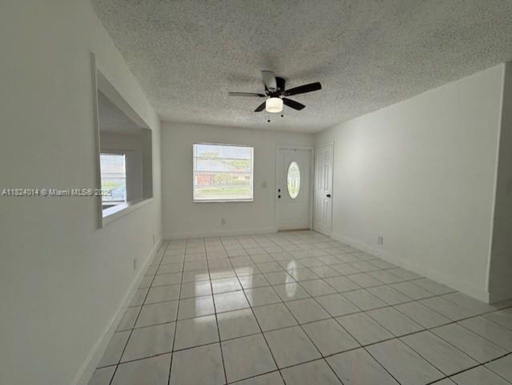 Photo of 4910 NW 18th St, Lauderhill, FL 33313 (MLS # A11824014)