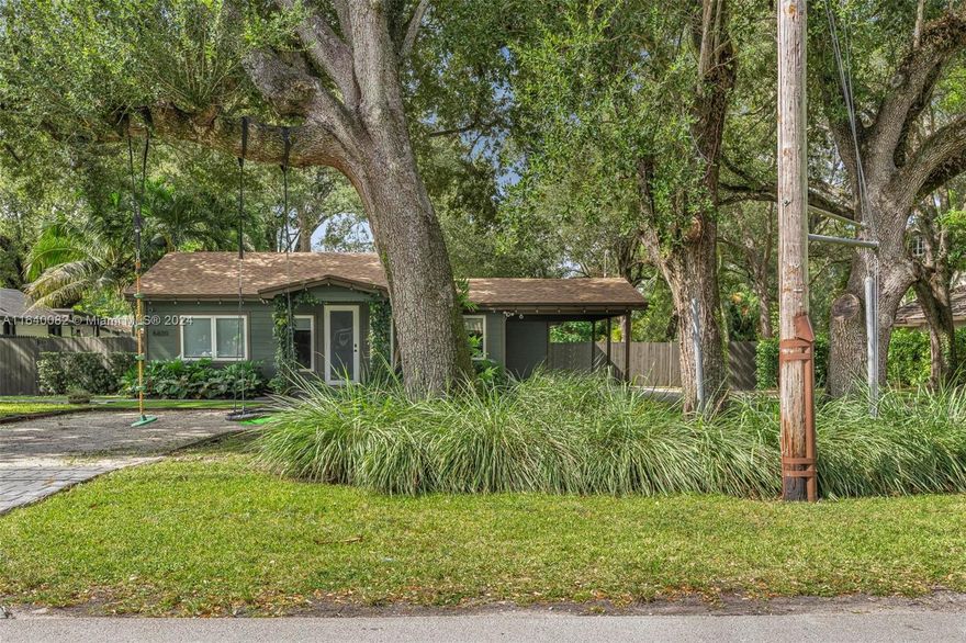 Prime development land awaits on coveted 69th Avenue. This expansive lot, adorned with mature Florida oaks and offering direct Ludlum Trail access, presents a unique dual opportunity. Build your dream home or explore subdivision potential to create multiple residential lots. The existing 3-bedroom, 2-bathroom home with a brand-new tile roof provides immediate income potential or comfortable living while you plan your next steps. Additionally there is a separate 1-bedroom and 1-bathroom perfect for an office or a guest quarters.