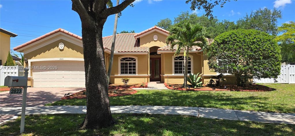 Photo of 2823 Poinciana Cir, Cooper City, FL 33026 (MLS # A12008762)
