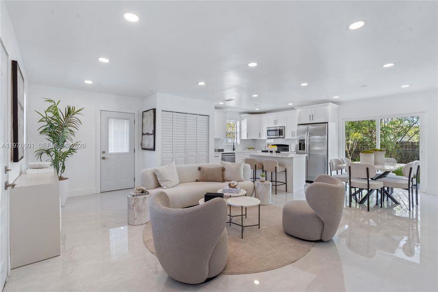 Welcome to this stunning FULLY RENOVATED 3-bedroom, 2-bathroom home in the heart of Deerfield Beach. Completely gutted and thoughtfully redesigned, this residence blends modern style with everyday functionality. Step inside to an open-concept layout featuring brand-new flooring, a sleek contemporary kitchen with custom cabinetry, quartz countertops, stainless steel appliances, and beautifully updated bathrooms with designer finishes. NEW windows and NEW appliances throughout. 
The spacious primary suite offers a private retreat with a luxurious en-suite bath, while the additional bedrooms provide flexibility for guests, a home office, or growing families. Major upgrades throughout provide peace of mind and move-in-ready convenience
Enjoy South Florida living with a generous backyard perfect for entertaining or relaxing year-round. Located just minutes from beaches, dining, shopping, and major highways, this home delivers the perfect balance of style, comfort, and location.