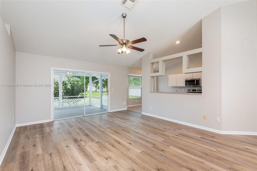 Photo of 1582 SE Berkshire Blvd, Port Saint Lucie, FL 34952 (MLS # A11589185)