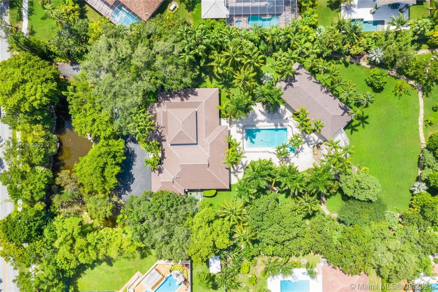 Exclusive Gables by the Sea Single Story Estate nested on a 2 acre lushly landscaped lot. Completely updated offering 7 large bedrooms, 6 bathrooms and a powder room. 

Double high ceilings in the living room with incredible design on social areas. This home is an Entertainer's Paradise that offers Resort style outdoor areas swimming pool with spa, covered terraces, gazebo and summer kitchen. 

Large detached guest house with a state of the art gym, steam shower and sauna. Property has a private entrance with a large lake creating optimal privacy and relaxing views. Its a must see!