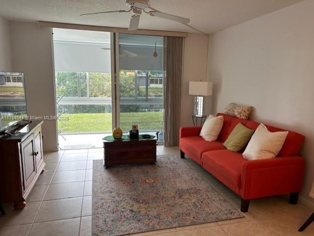 Photo of 9350 Sunrise Lakes Blvd #109, Sunrise, FL 33322 (MLS # A11784544)