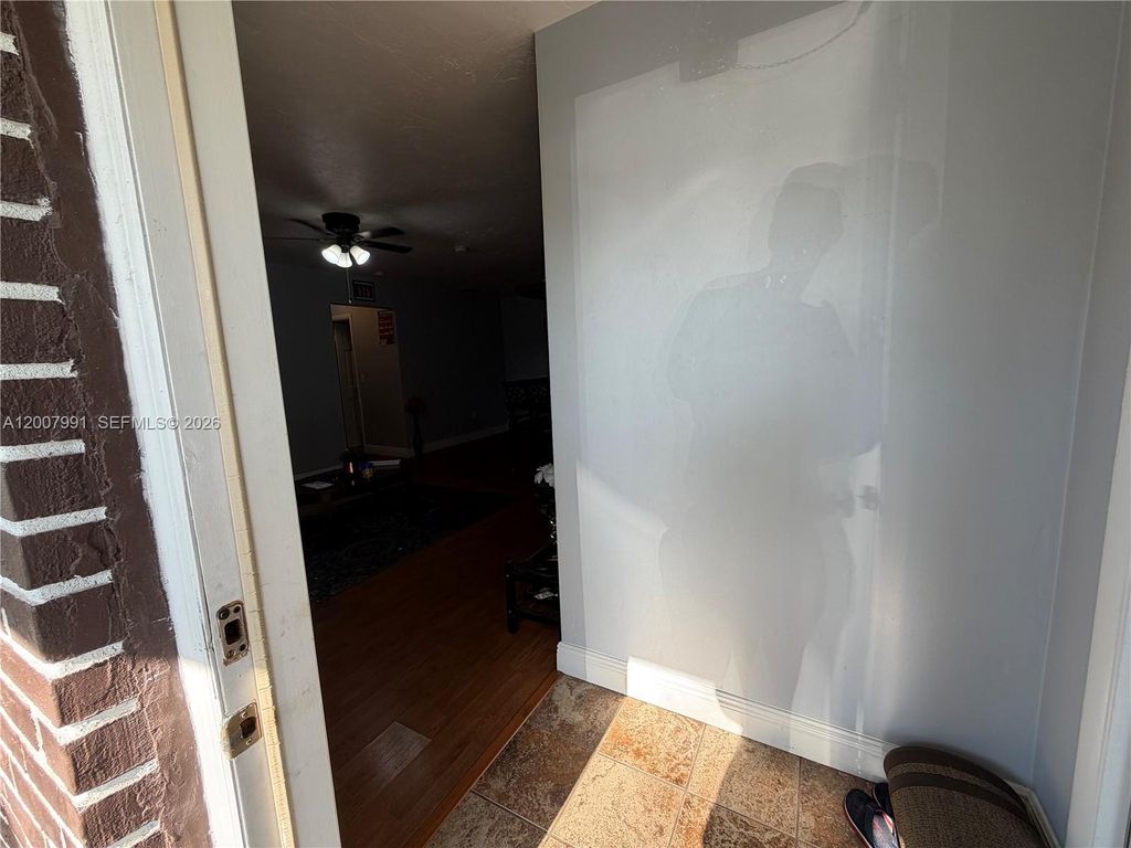 Photo of 1160 NW 77th Way #1160, Pembroke Pines, FL 33024 (MLS # A12007991)