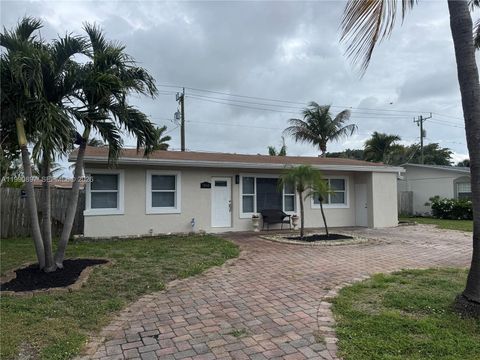 Photo of 1460 NE 30th Ct, Pompano Beach, FL 33064 (MLS # A11990897)