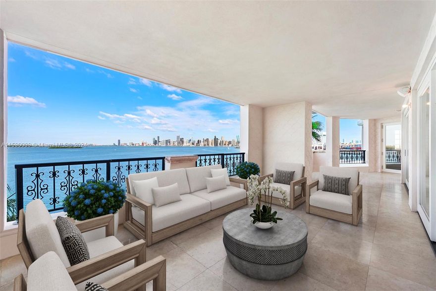 Live the Fisher Island lifestyle in this stunning flow through renovated 6th floor Bayview unit overlooking the Miami Downtown Skyline, Biscayne Bay, Virginia Key and Miami Beach. Features include: 4 bedrooms, 4.5 baths and a spacious 3,790 sq ft interior, open floor plan and expansive terraces. It includes: two spacious principal bedrooms with terraces, crown moldings, wood panels, elegant oak herringbone  floors throughout, St Charles gourmet kitchen, with top of the line appliances, impact glass doors, automated window treatments and countless other features. The photos have been virtually staged with furniture, light fixtures, decorative items and art. Embrace the epitome of elegance and sophistication in this exceptional unit!