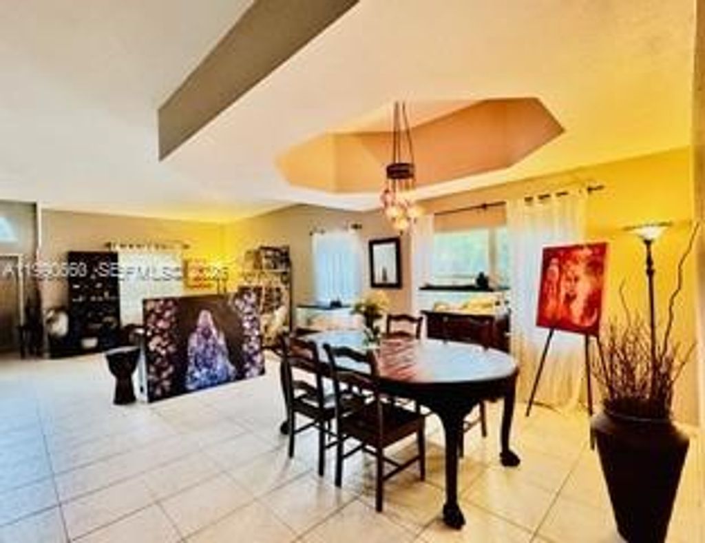 Photo of 1040 NW 185th Ave, Pembroke Pines, FL 33029 (MLS # A11990660)