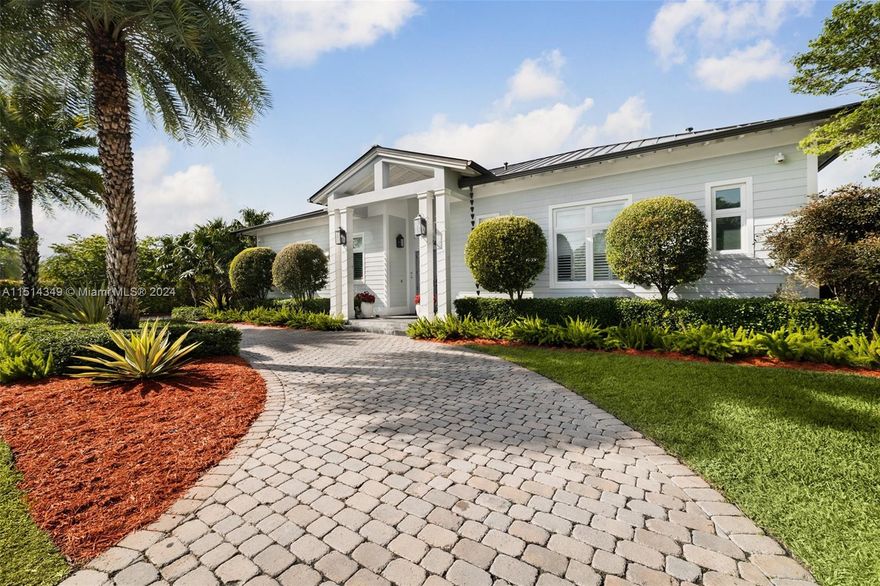 Welcome to your slice of paradise where Pinecrest meets Palmetto Bay! This stunning 2017 Key West style home  blends modern luxury with tropical elegance. Boasting 4 bedrooms and 3.5 bathrooms, + a beautiful 1/1 guest quarters. This home is a testament to thoughtful design and meticulous craftsmanship. 924 sq ft covered terrace, with breathtaking views of a 17,232 sq. ft. lot unfold before you. Tropical surroundings and privacy perfect for entertaining. Open your multi-slide patio doors and experience your indoor and outdoor space become one. Among the many features this home boasts, a Kohler full-house generator, smart-home living with Control 4 systems that allow you to control all lighting, air conditioning, alarm system, security cameras and sound system- all from your phone.