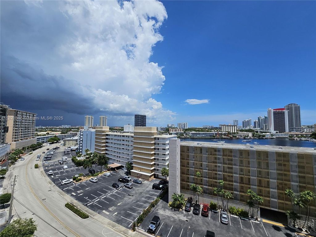 Photo of 401 Golden Isles Dr #1015, Hallandale Beach, FL 33009 (MLS # A11820596)