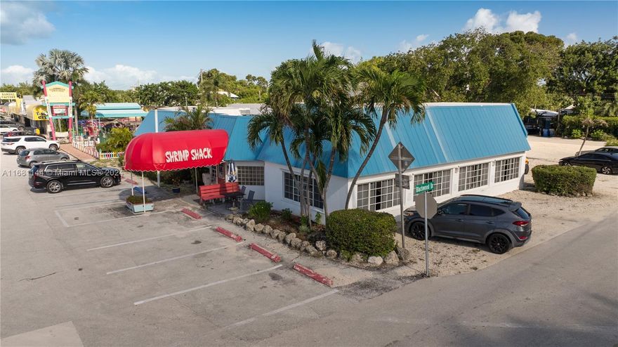 SELLER MOTIVATED! Turnkey Restaurant opportunity with prime US1 Frontage in heart of downtown Islamorada! Rare 160-seat restaurant on a highly visible corner lot w/ high visibility on US1, offering ample parking & incredible potential. Accessible from both US1, Blackwood Dr & Old Hwy, this property is ideally located within walking distance to world class high-end resorts, boutique shops, art galleries, & other popular Islamorada attractions. Sale includes valuable Real Estate comprised of the 4,942 sqft building on a 16,746 sqft 'X' flood zone lot; Village Center zoning allows for many uses. All furniture, fixtures & equipment, food truck, transferable liquor license conveys, longtime local staff in place. Continue the legacy or bring your vision to the highly desirable Islamorada market!