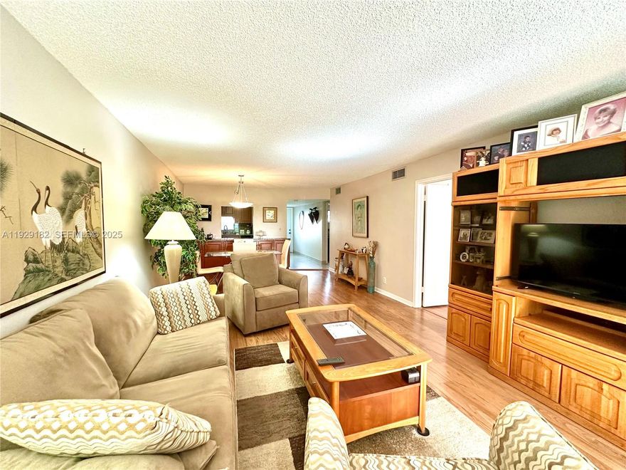 Enjoy relaxing garden  views from your screened in porch. The apartment is located on the first floor and features a spacious, updated kitchen with room for a small table, and updated bathrooms with tile and laminate floors through out.  Owners get to enjoy the resort style living with many amenities including one 18 hole executive golf course and one PGA 18 hole golf course for only $28. Golf carts also available.  Lots of amenities, including Club house, gym, multiple pools, tennis, pickleball, restaurant, BBQ/picnic area,  courtesy bus, heated pool,  sauna,  billiard room, shuffleboard, and more. The community is located close to shopping, dining, and highways for your convenience.