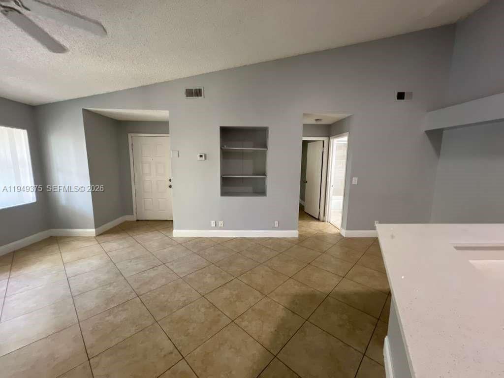 Photo of 9999 Summerbreeze Dr #715, Sunrise, FL 33322 (MLS # A11949375)