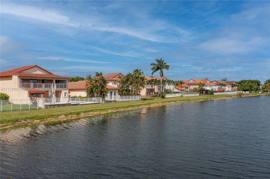 Original owner of gorgeous two-story LAKEFRONT 4 beds 3.5 baths home with pool and jacuzzi says SELL!  Customized at time of purchase from the developer, this estate offers unique features: 1) full pool bath + terrific roofed bar - perfect future outdoor kitchen!!  2) huge second-story balcony overlooking the lake & pool  3) a bonus office! All bedrooms upstairs, den can easily become 5th bedroom on ground floor. Endless potential to make this your perfect HOME. Roof 2018, accordion shutters, vaulted ceilings, crown moldings, 2 car garage. Easy access from the 24-hour manned security gate. Short distance from K-8 school, private clubhouse with reception hall, restaurant, gym, olympic pool/jacuzzi, tennis courts, playground, parks. REQUEST ALL SHOWINGS VIA SHOW assist, 24 hour notice please