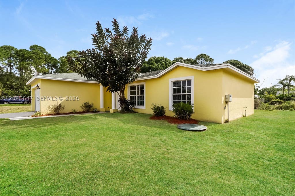 Photo of 3201 SW Collings Dr, Port St Lucie, FL 34953 (MLS # A12046647)