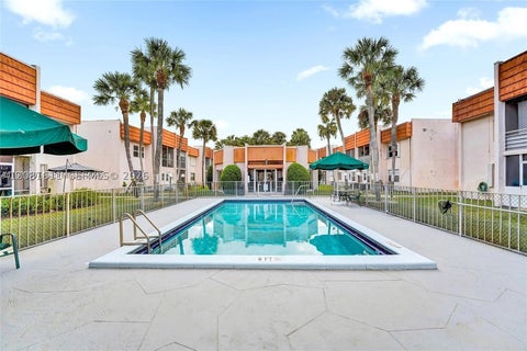 Photo of 7610 Stirling Rd #207C, Davie, FL 33024 (MLS # A12081611)